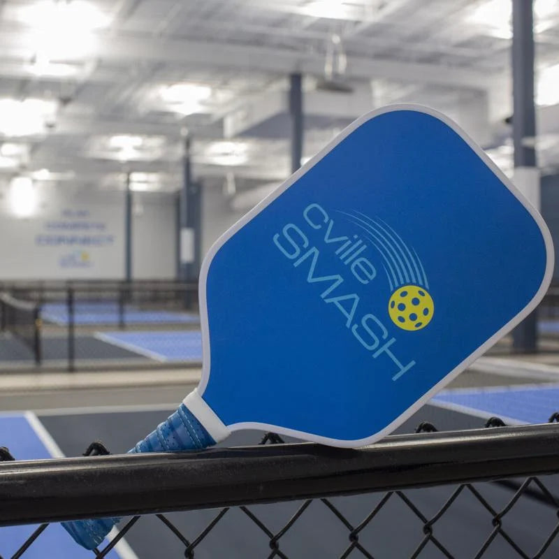 Blue pickleball paddle with &